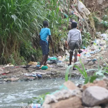 Trashy-innoscence.-Chldren-play-along-Mathare-River-oblivious-of-the-health-risks-posed.-PHOTO-BY-OTIATO-OPALI-scaled-1