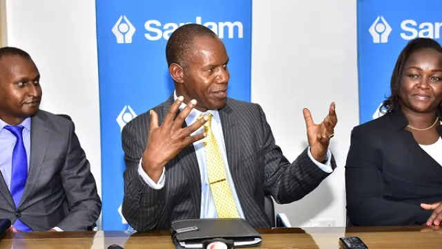 Sanlam Life Insurance Principal Officer Kevin Mworia, Group CEO Patrick Tumbo and Sanlam General Insurance CEO Caroline Laichena