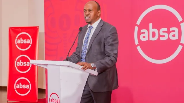 Absa Life Managing Director Waiguru Githanji speaking at a past event.