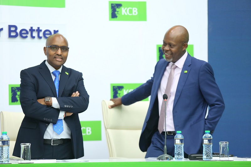 KCB Group CEO Paul Russo (left) with the Regional lender's Group Chief Financial Officer Lawrence Kimathi during the bank's 52nd Annual General Meeting.